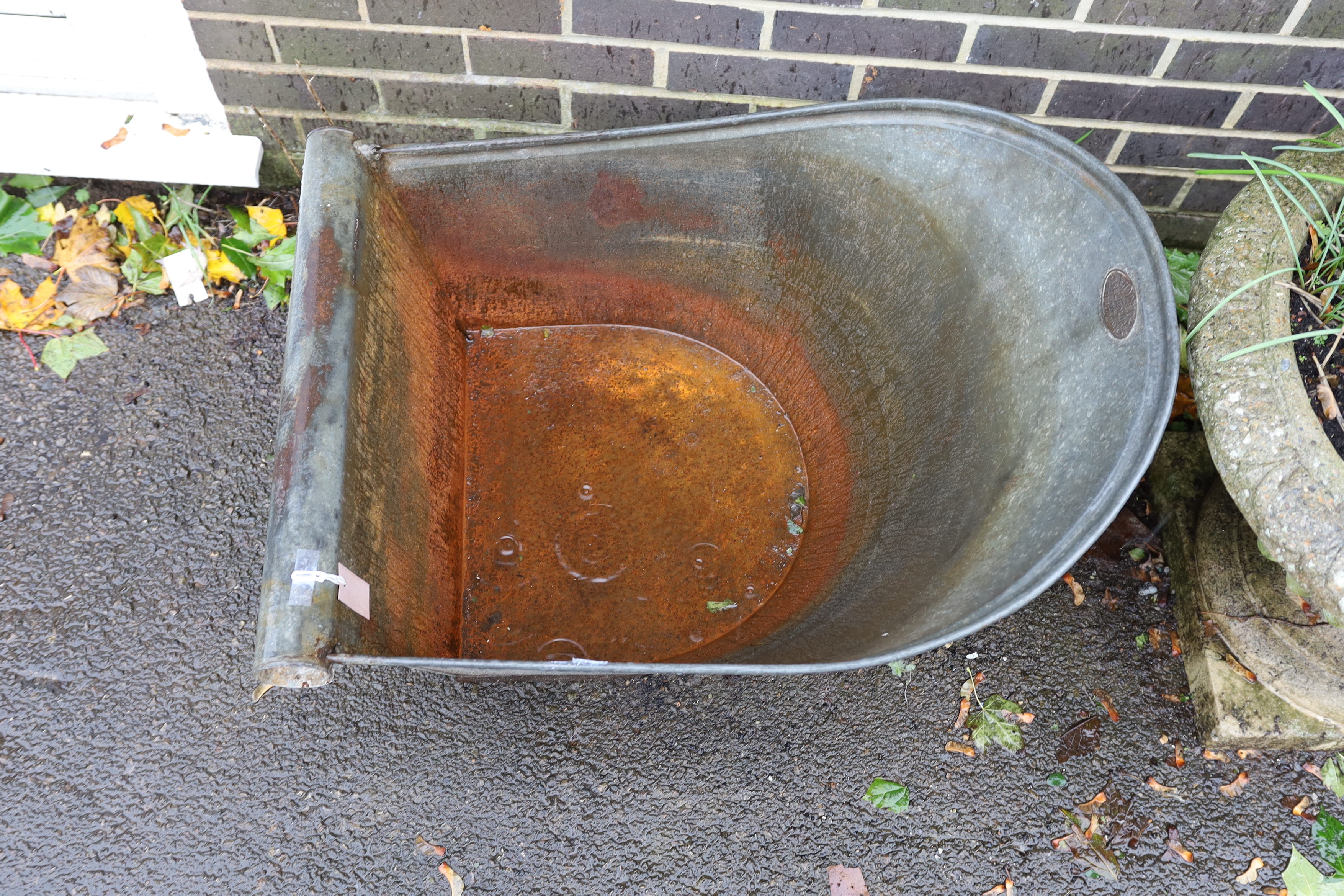 A vintage French galvanised child's bath length 84cm, width 60cm, height 54cm